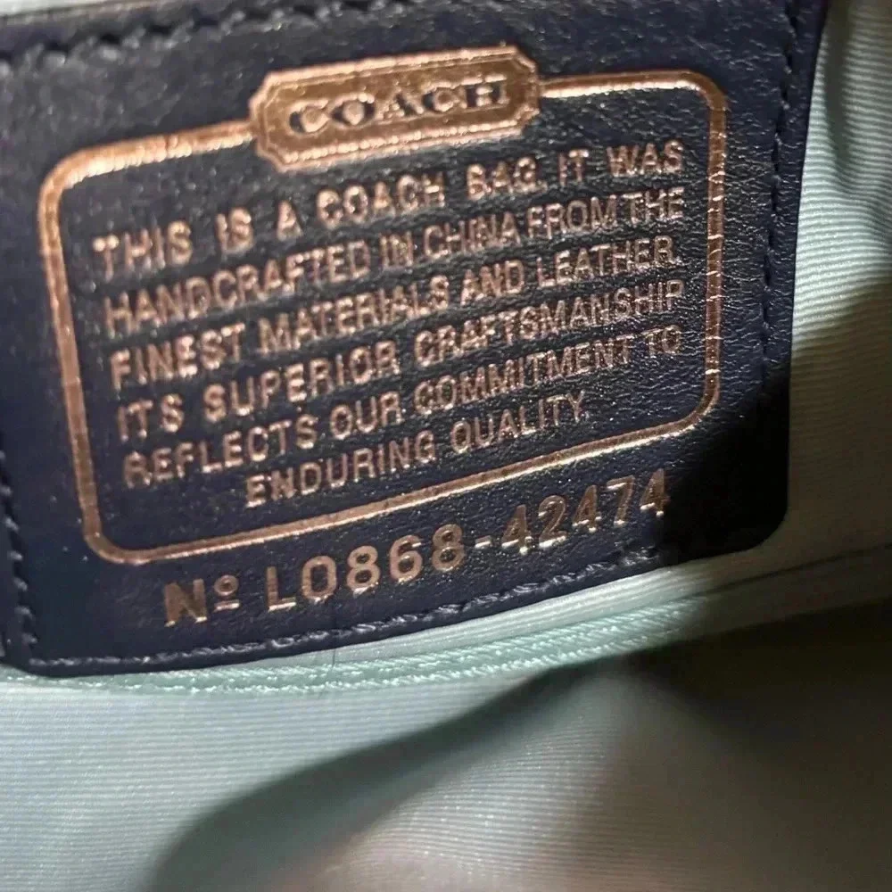 Coach beige straw & navy blue leather clutch wristlet